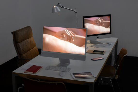 What Do People Do All Day, 2020-22. HD Video, sound, 25 min, loop, commercial art gallery, office environment. Exhibition view FRANCESCA MININI, Milano
